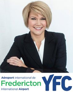 Johanne Gallant with Fredericton International Airport YFC logo