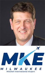 Brian Dranzik with Milwaukee Mitchell International Airport logo