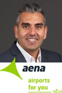 Cesar Nava with Aena logo