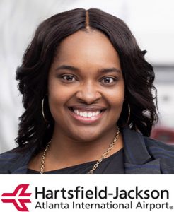 Tyronia Smith with Hartsfield Jackson Airport logo
