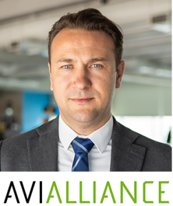 Martins Tamovics with AviAlliance logo