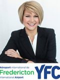 Johanne Gallant with Fredericton International Airport YFC logo